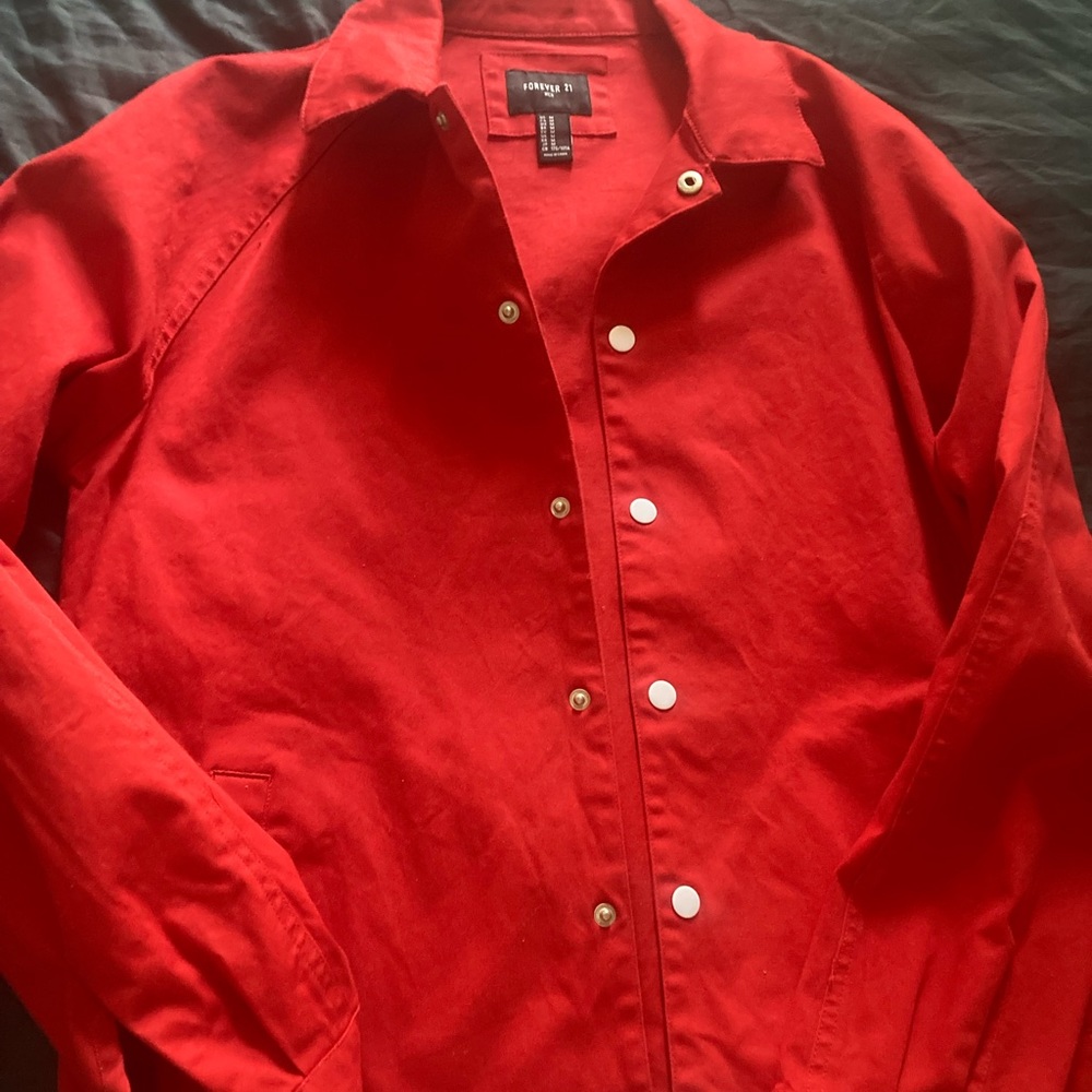 In new condition. Size m forever 21 red jacket